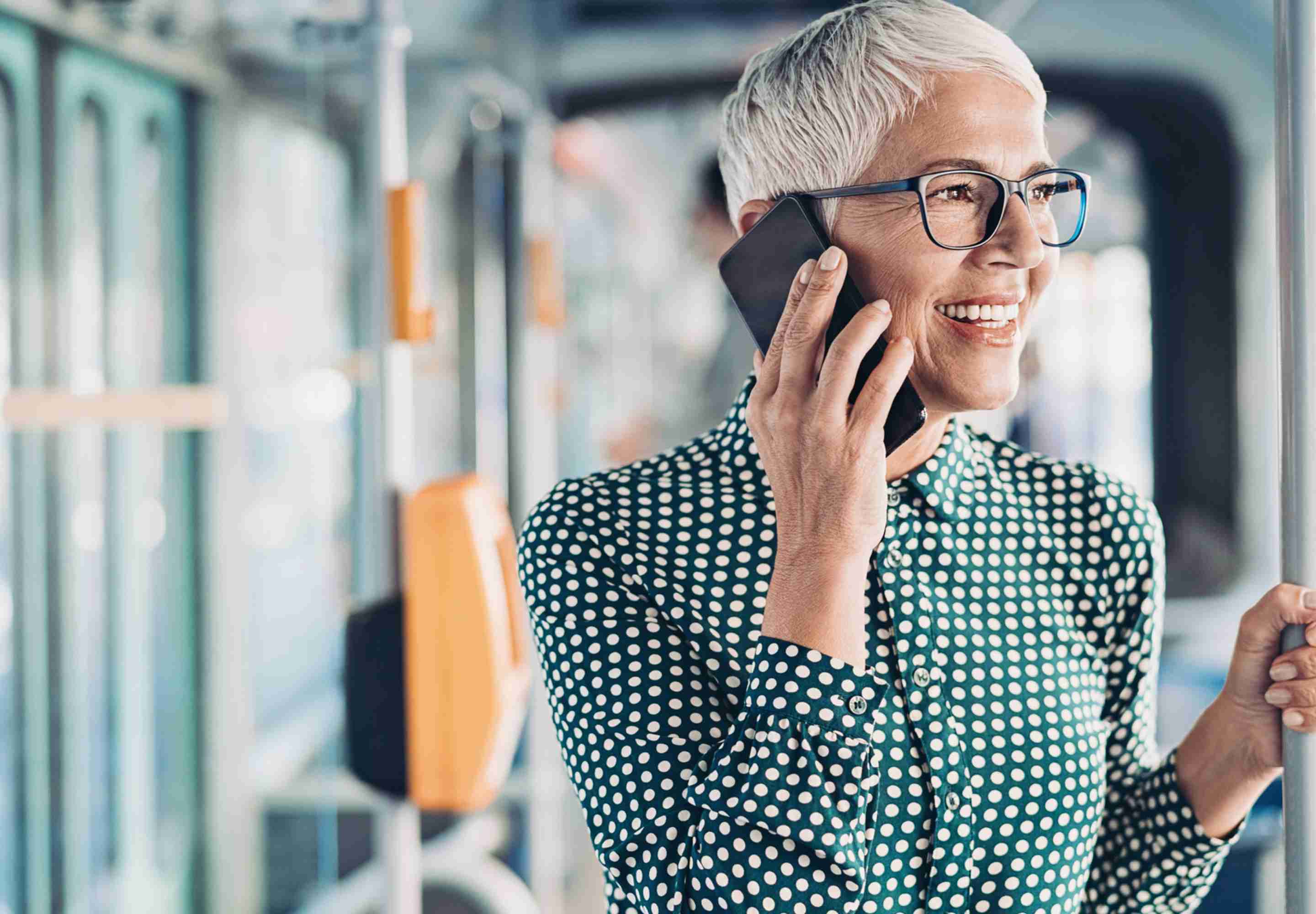 Lady on phone in bus