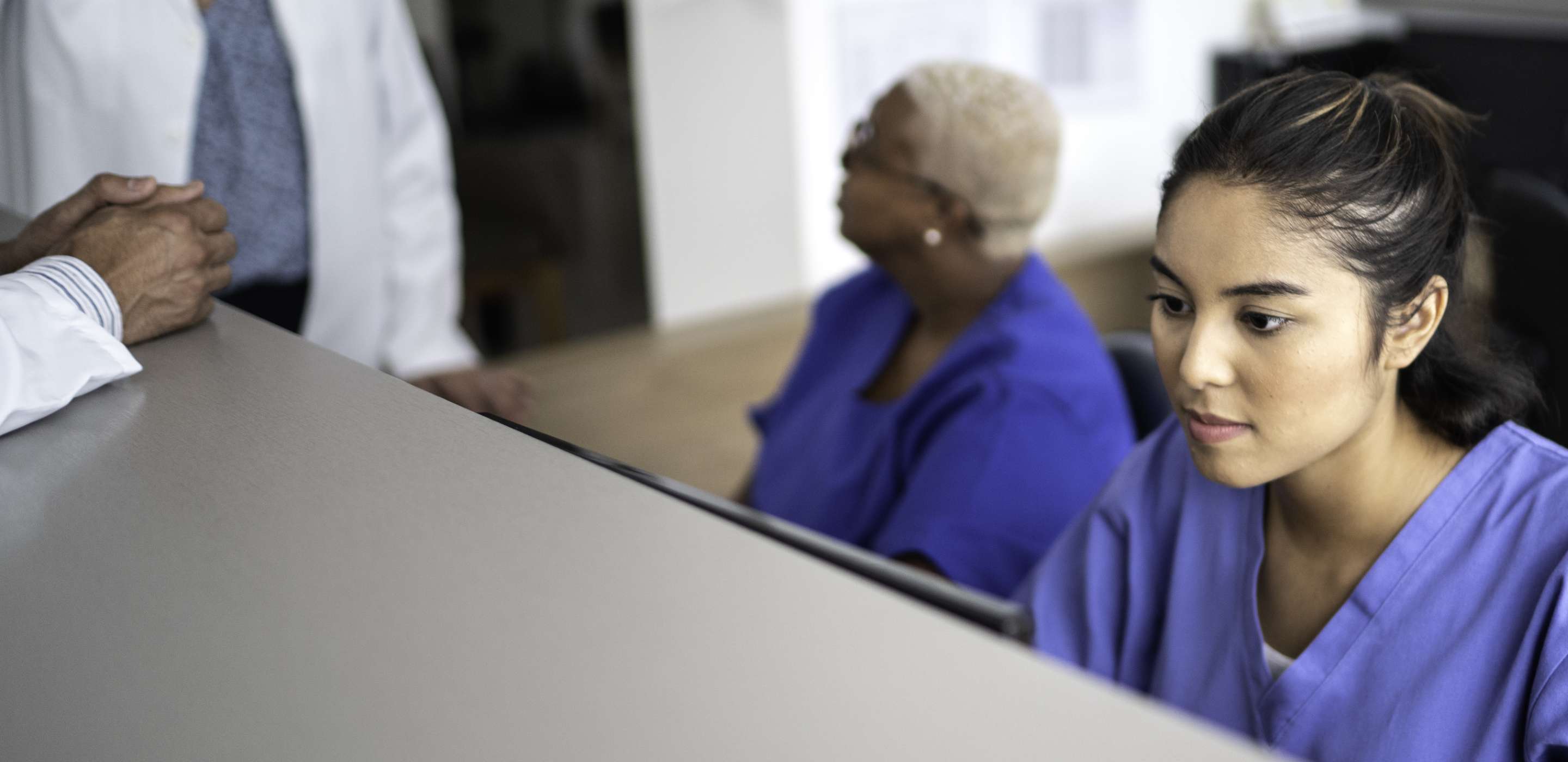 Secretary working at hospital reception