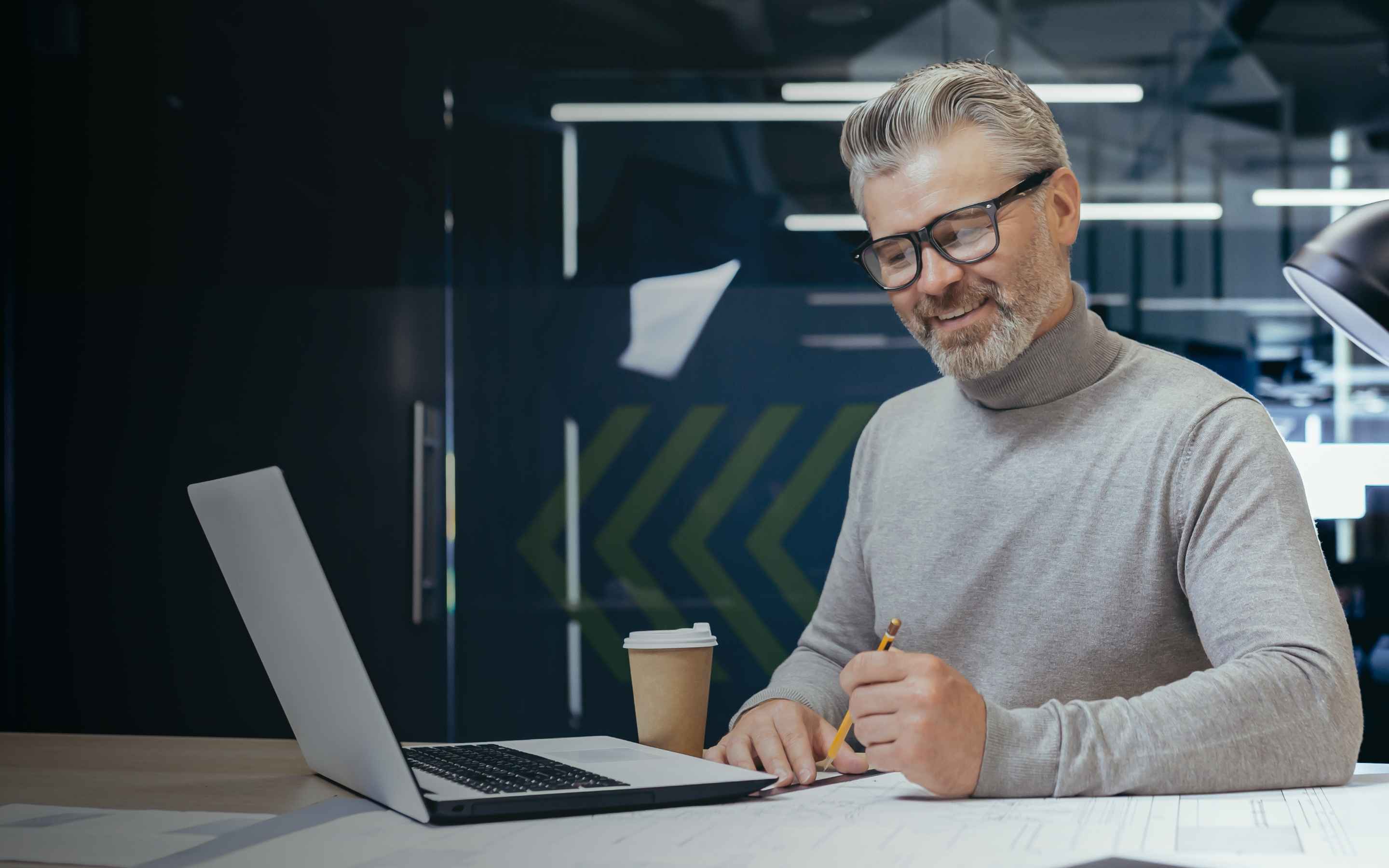 A man looking at a laptop screen