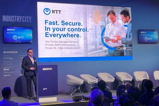 A man presenting from a projector