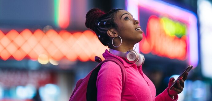 Lady with headphones looking up